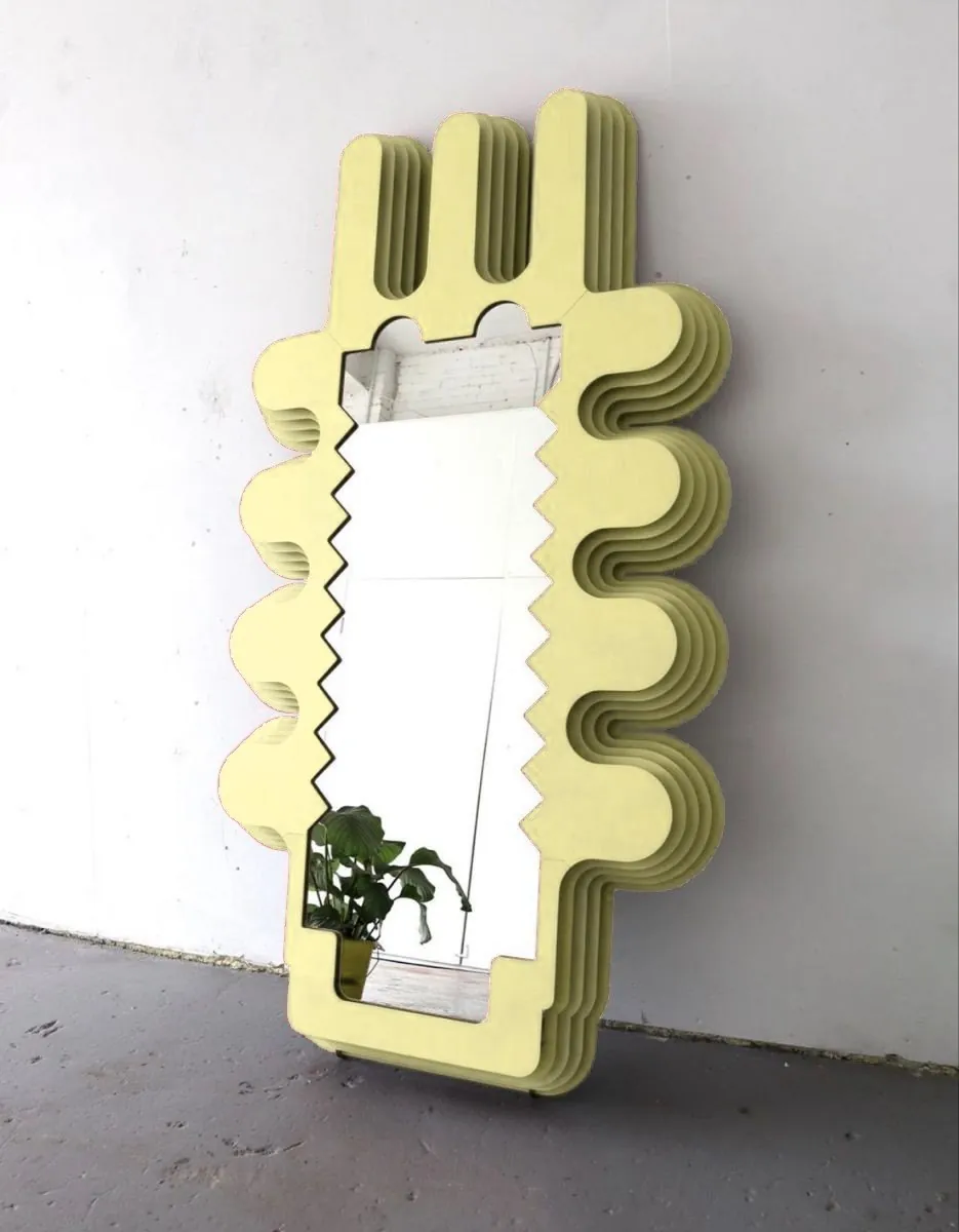 Ripple Mirror: tall butter-yellow leaning mirror with stacked rippling layers